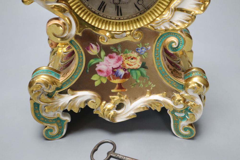 A late 19th century French porcelain mantel clock, with French movement, countwheel striking on a bell, height 40cm